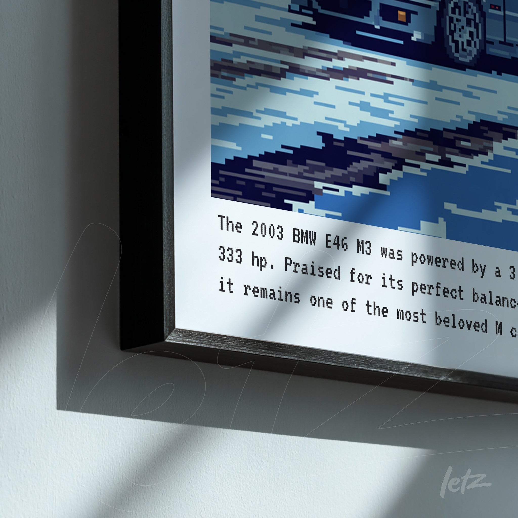 framed wall art featuring pixelated illustration of BMW E46 M3 in blue background