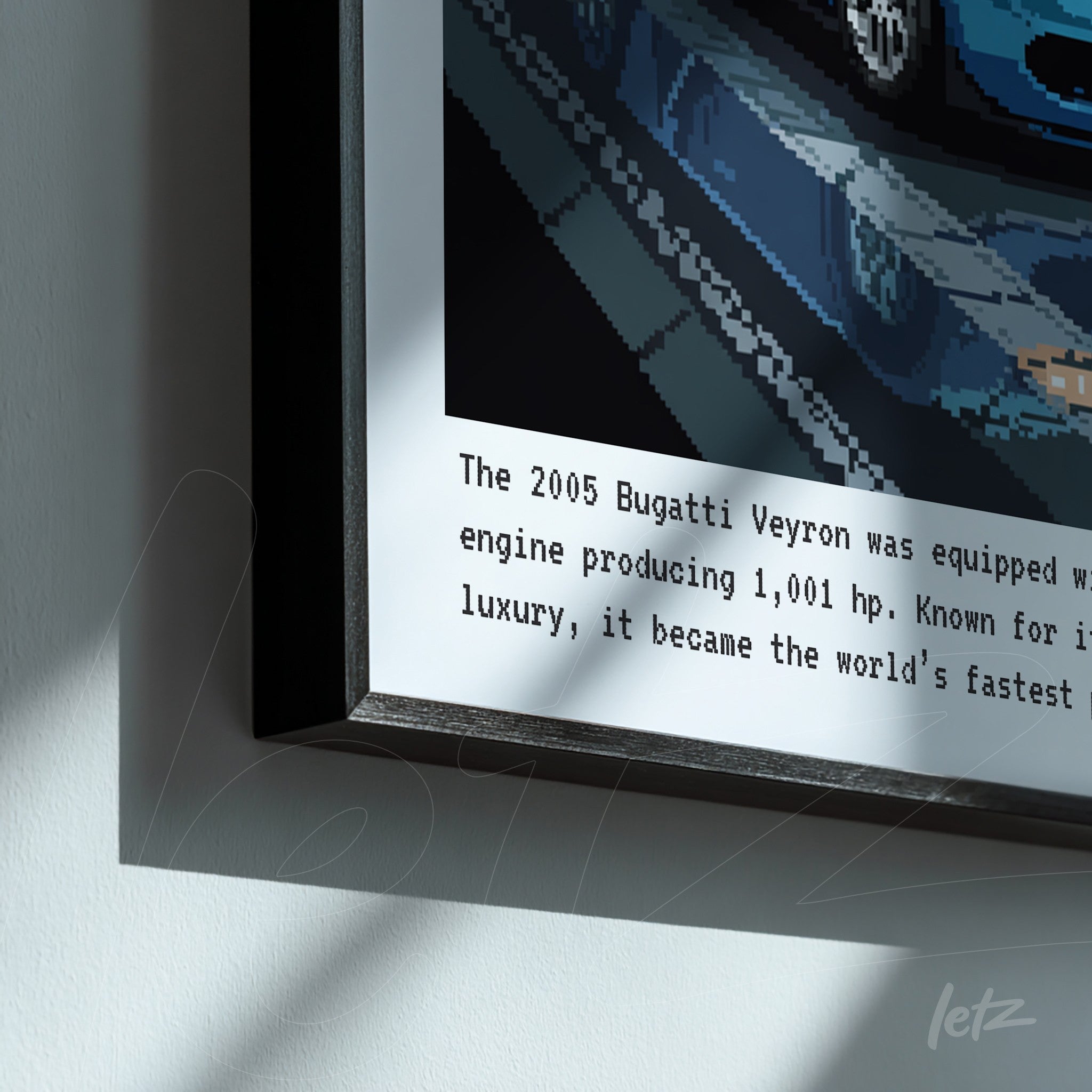 framed digital artwork of a Bugatti Veyron with descriptive text in black frame