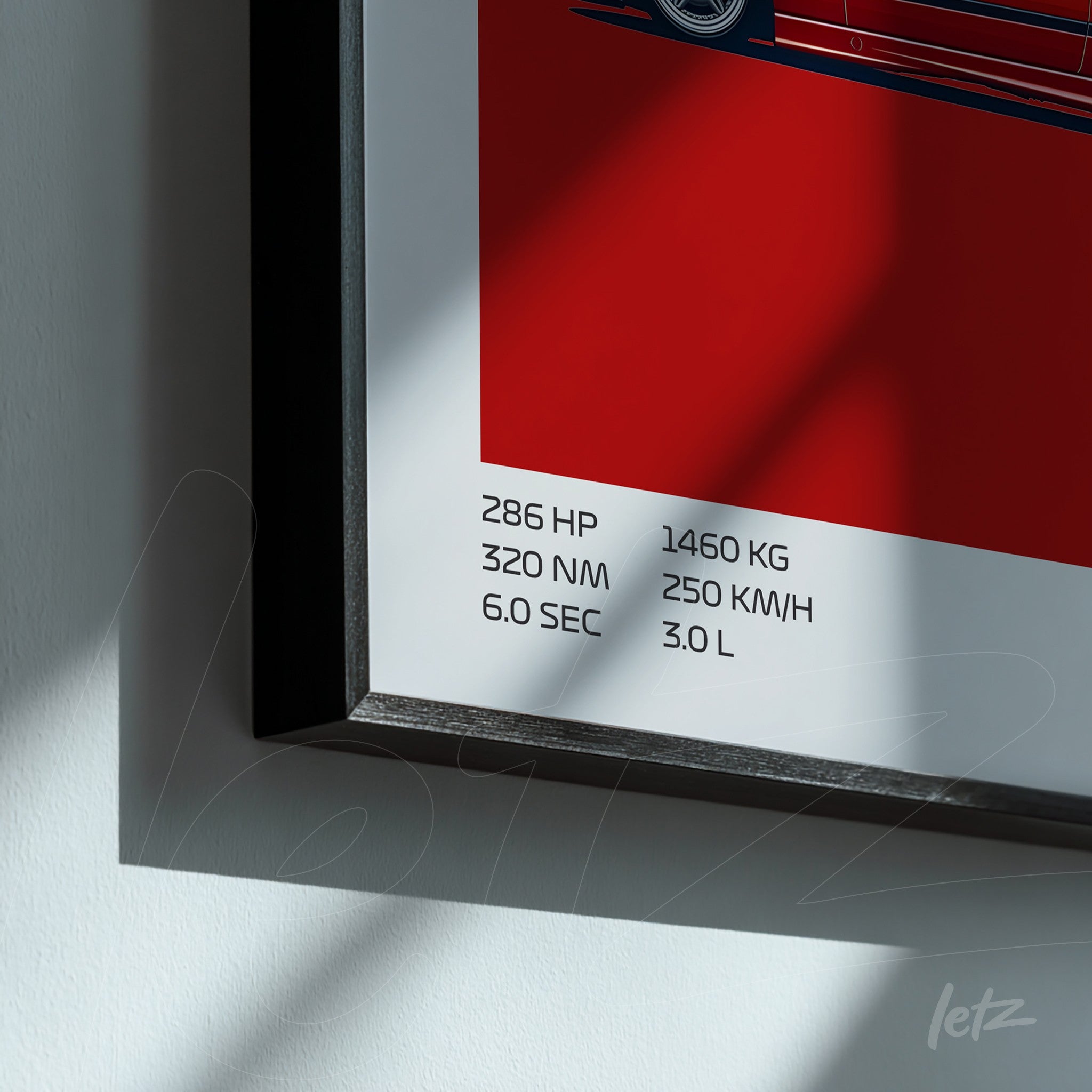 framed wall art featuring a minimalist illustration of a sports car with bright red background and technical specifications at the bottom