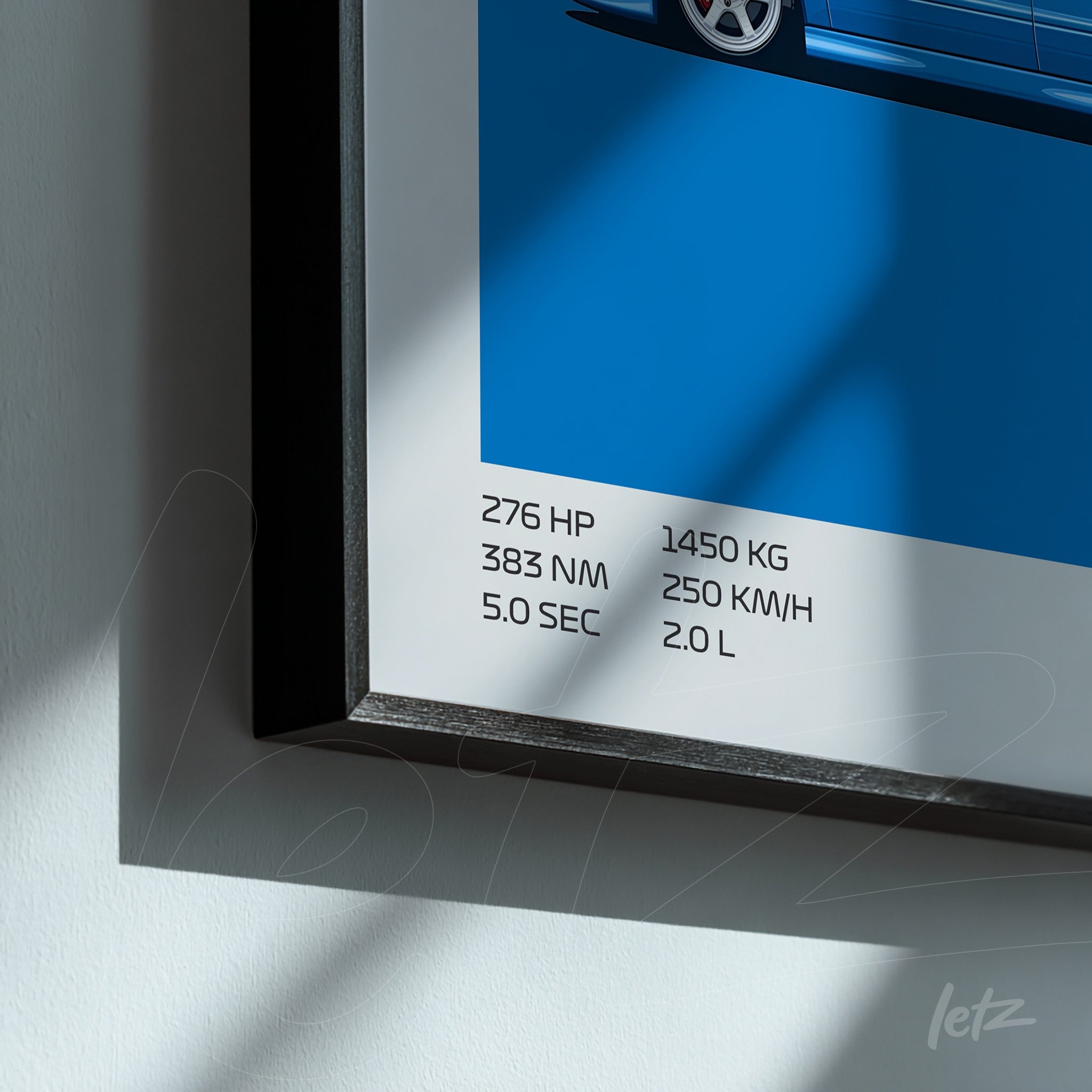 framed wall art featuring a sports car with a vibrant blue background and technical specifications on the right
