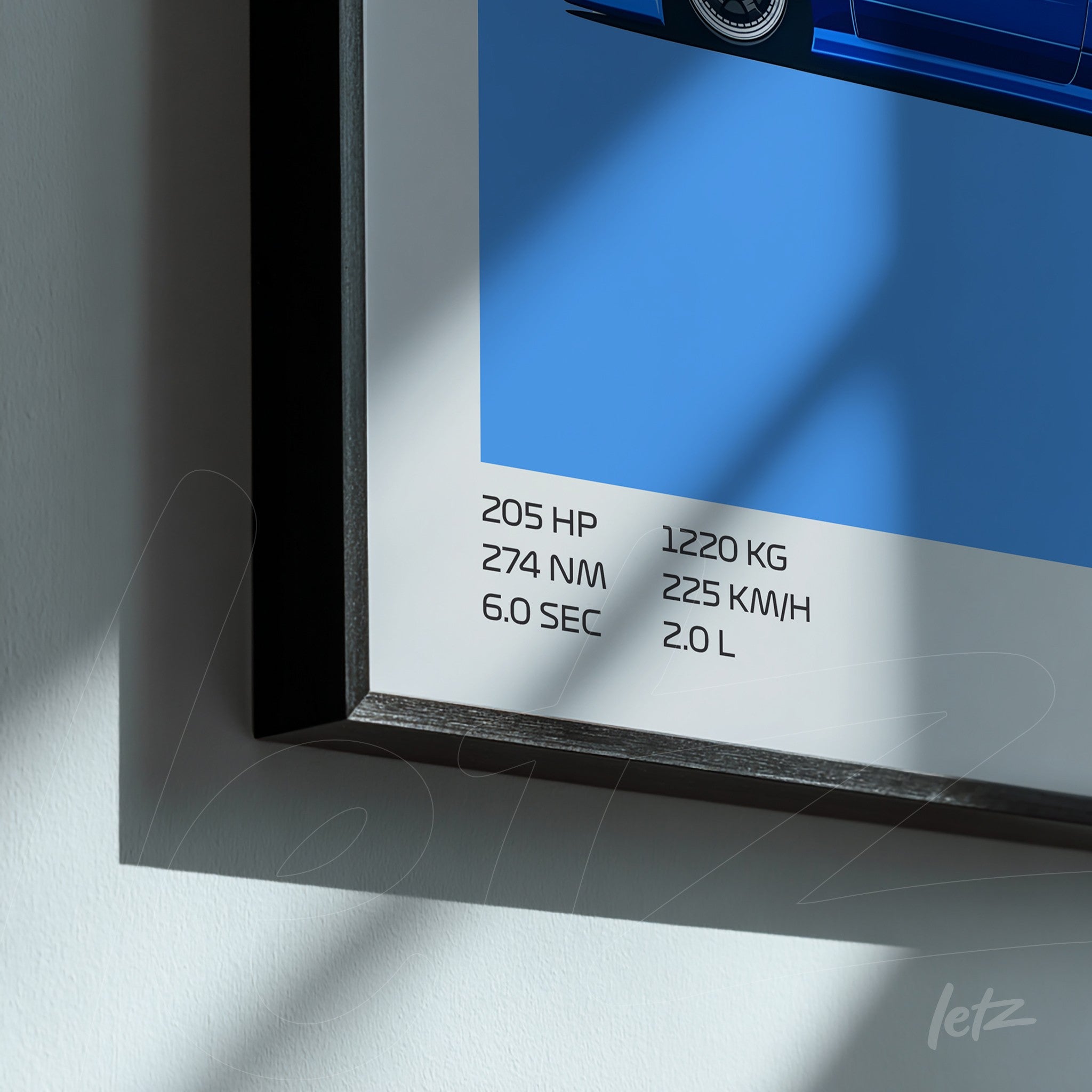 framed wall art featuring graphic of car against blue background, displaying technical specifications in clear text