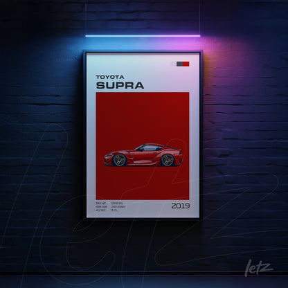 framed wall art featuring a red Toyota Supra illustration with graphic details and a black frame