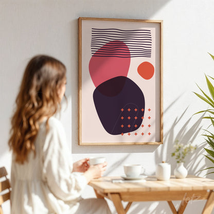 canvas print with geometric abstract art in a natural wood frame displayed on white wall