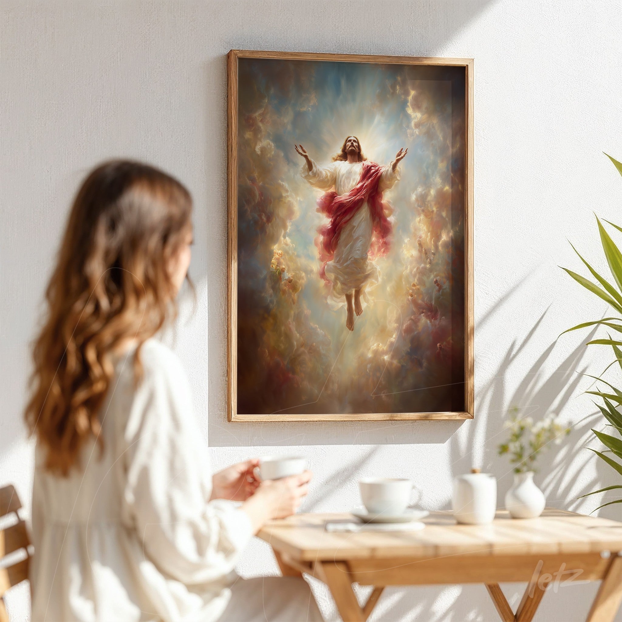 framed religious artwork of Jesus Christ ascending with light clouds in the background, displayed on a white wall beside a woman sitting