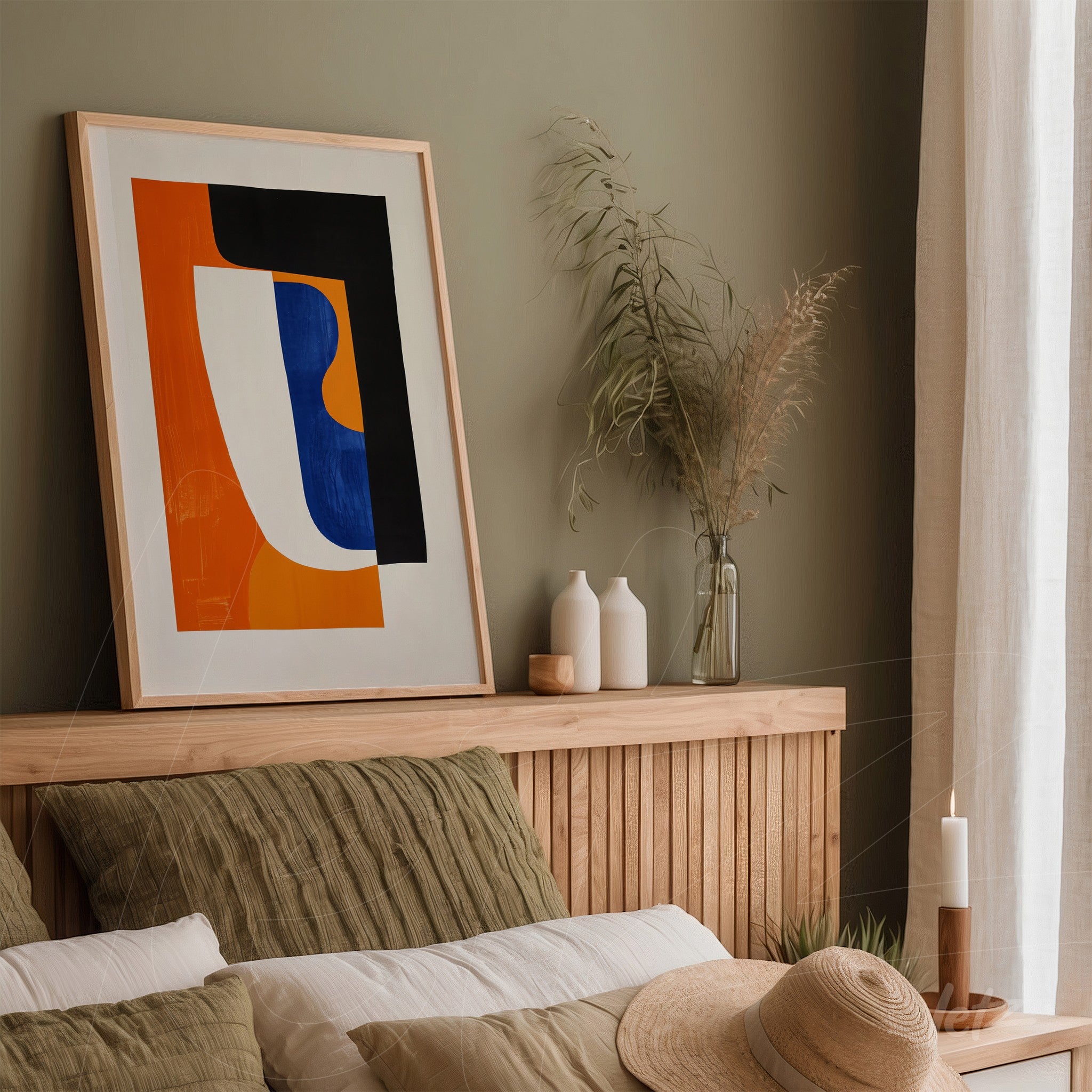 abstract art piece in vibrant colors framed in light wood, displayed in a room with green walls and minimalist decor