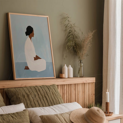 modern art framed depiction of a seated woman in a bedroom setting with green walls and light wood furniture