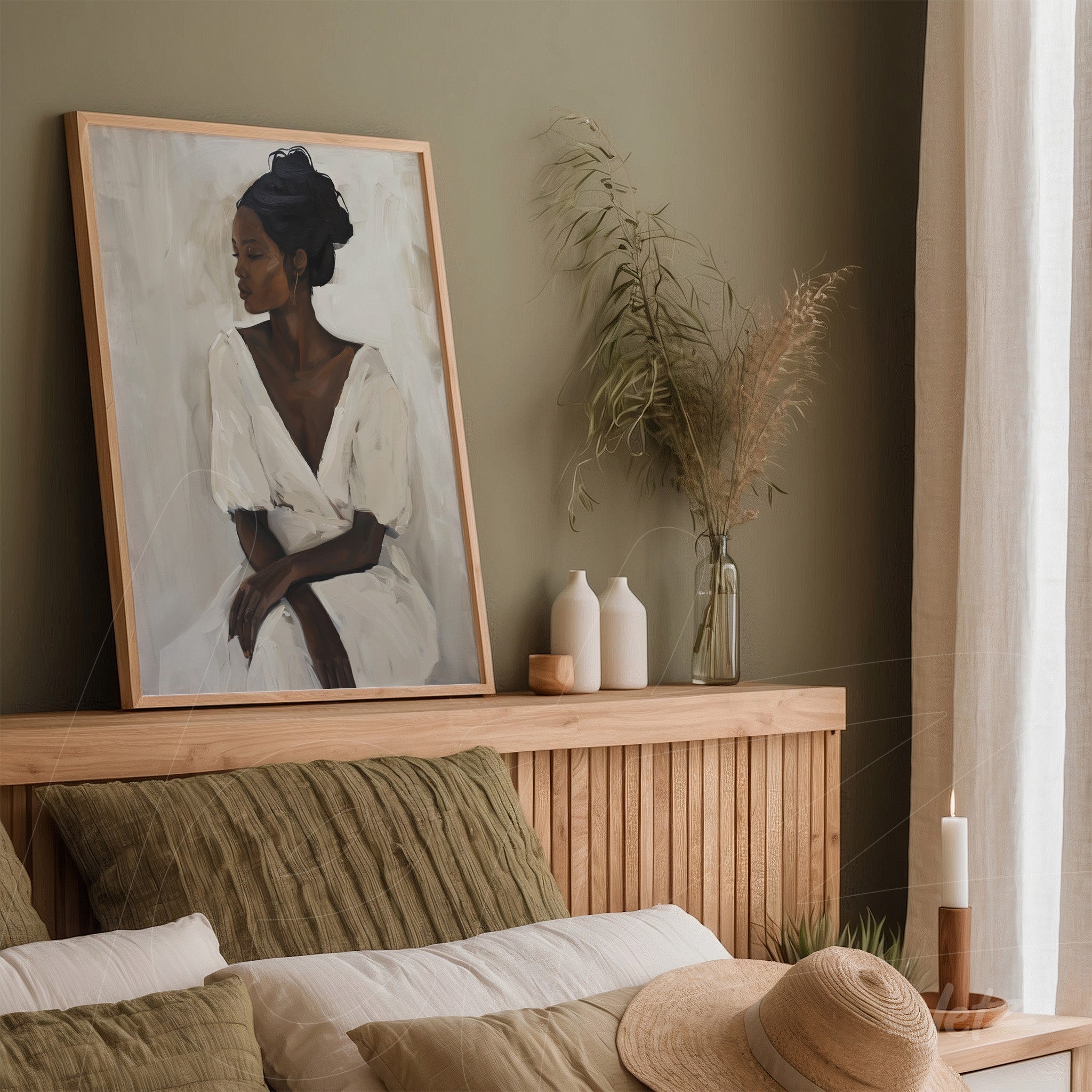 framed modern art portrait of a thoughtful woman displayed in a cozy setting with green walls