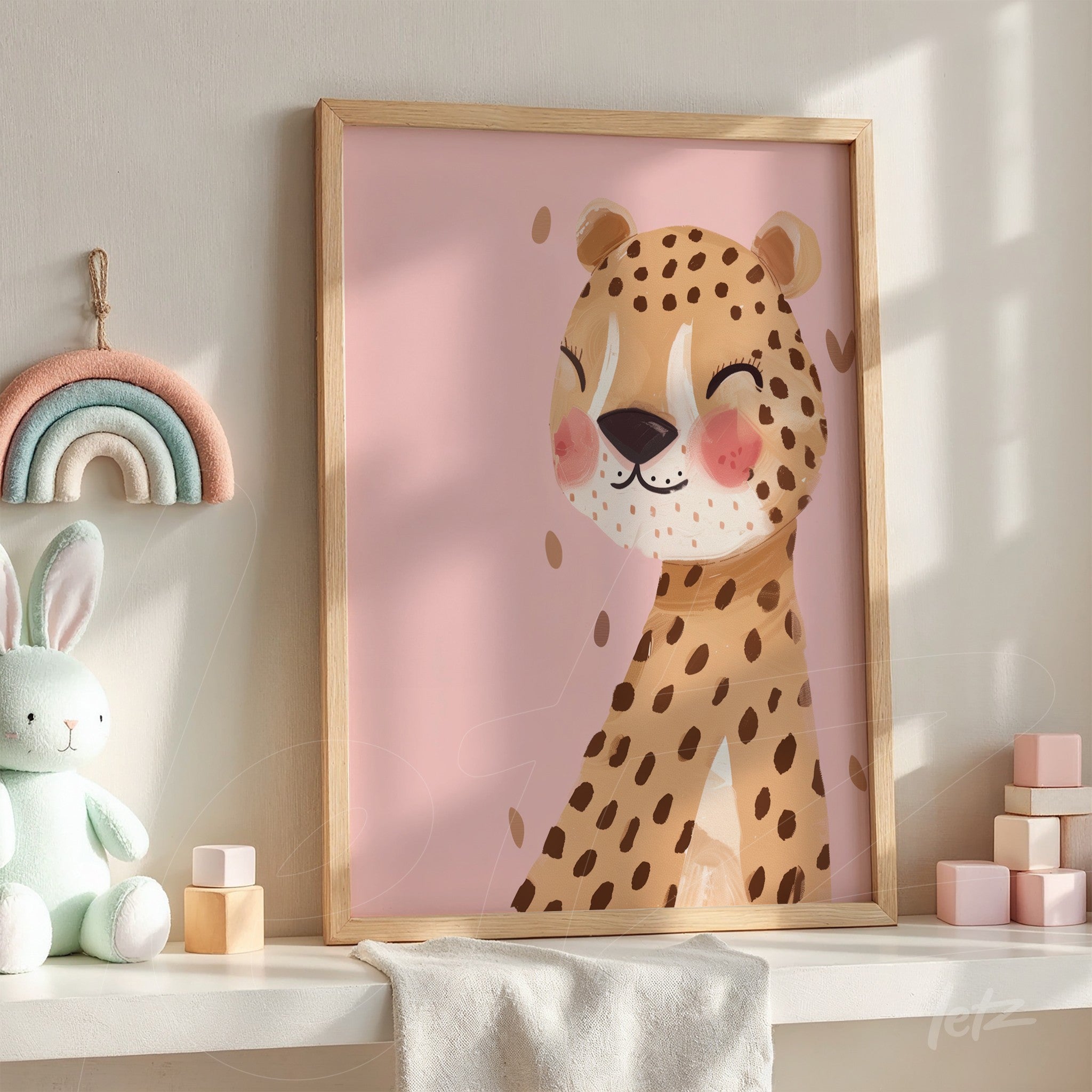 framed artwork of a smiling cheetah on a pink background with light wood frame
