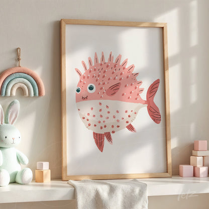 framed wall art of a curious fish in light wood frame displayed on a table with playful decor