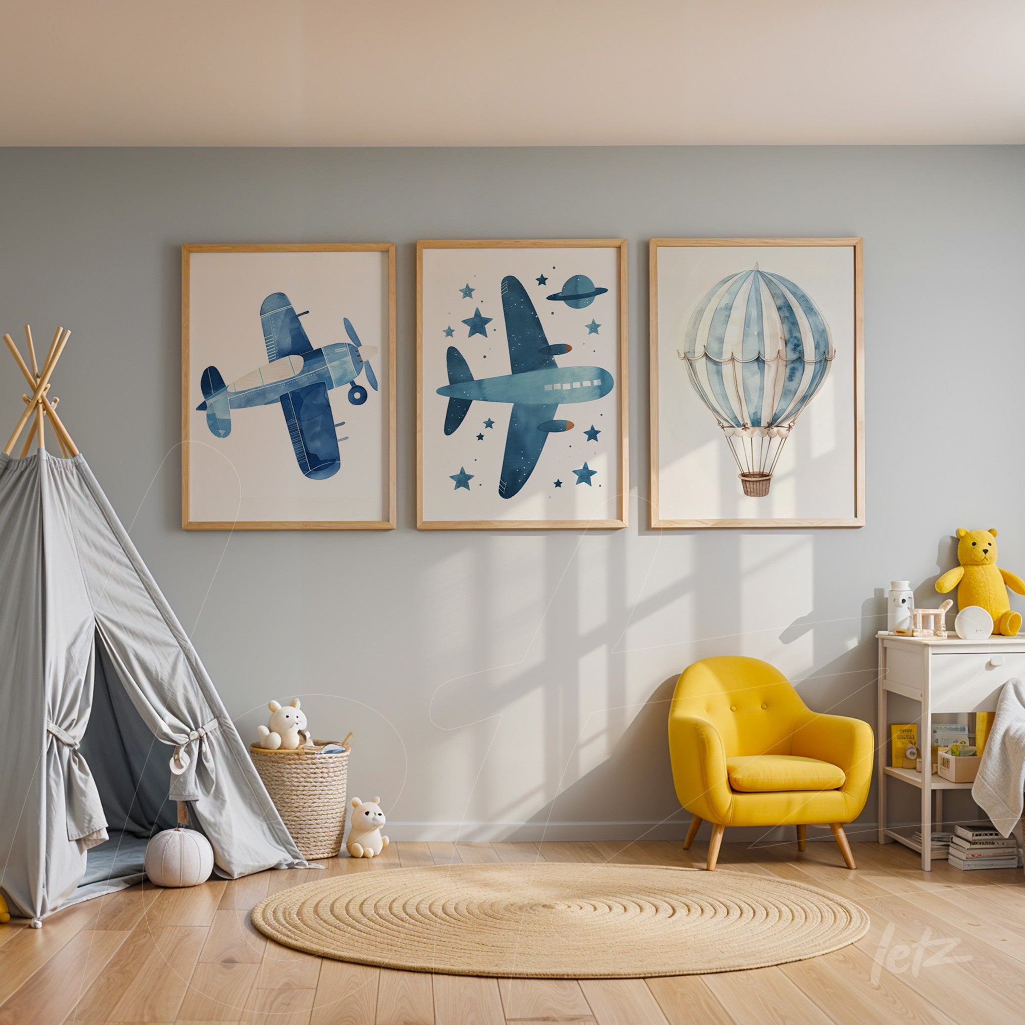 set of playful wall art featuring illustrations of an airplane, rocket, and hot air balloon in light wood frames displayed on a soft blue wall beside a cozy corner