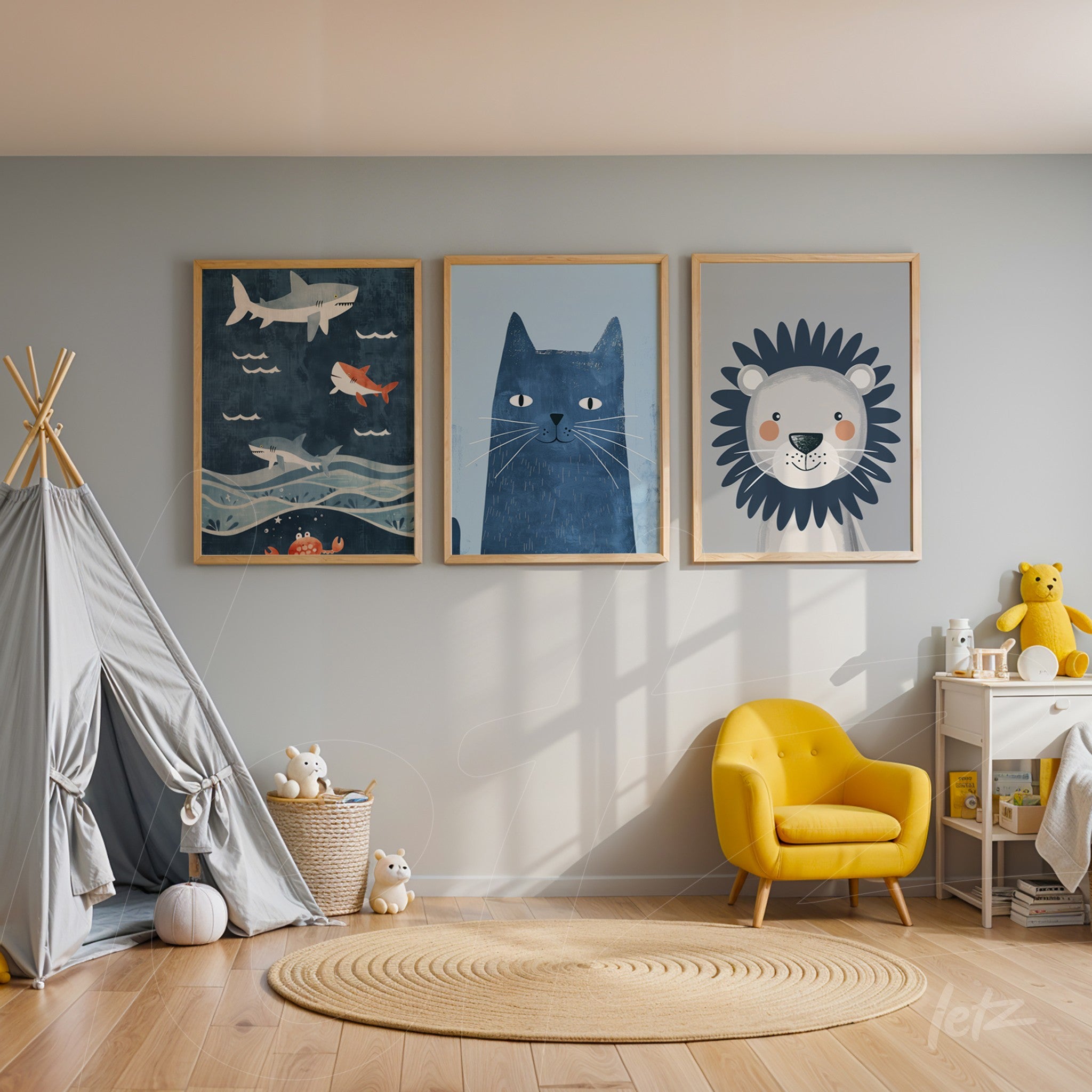 a composition of three framed wall art pieces featuring a blue cat, a friendly lion, and swimming fish on a blue background, displayed on a light gray wall with light wooden frames