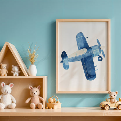 framed art featuring a blue airplane illustration in a light wood frame displayed against a blue wall next to shelves with plush toys