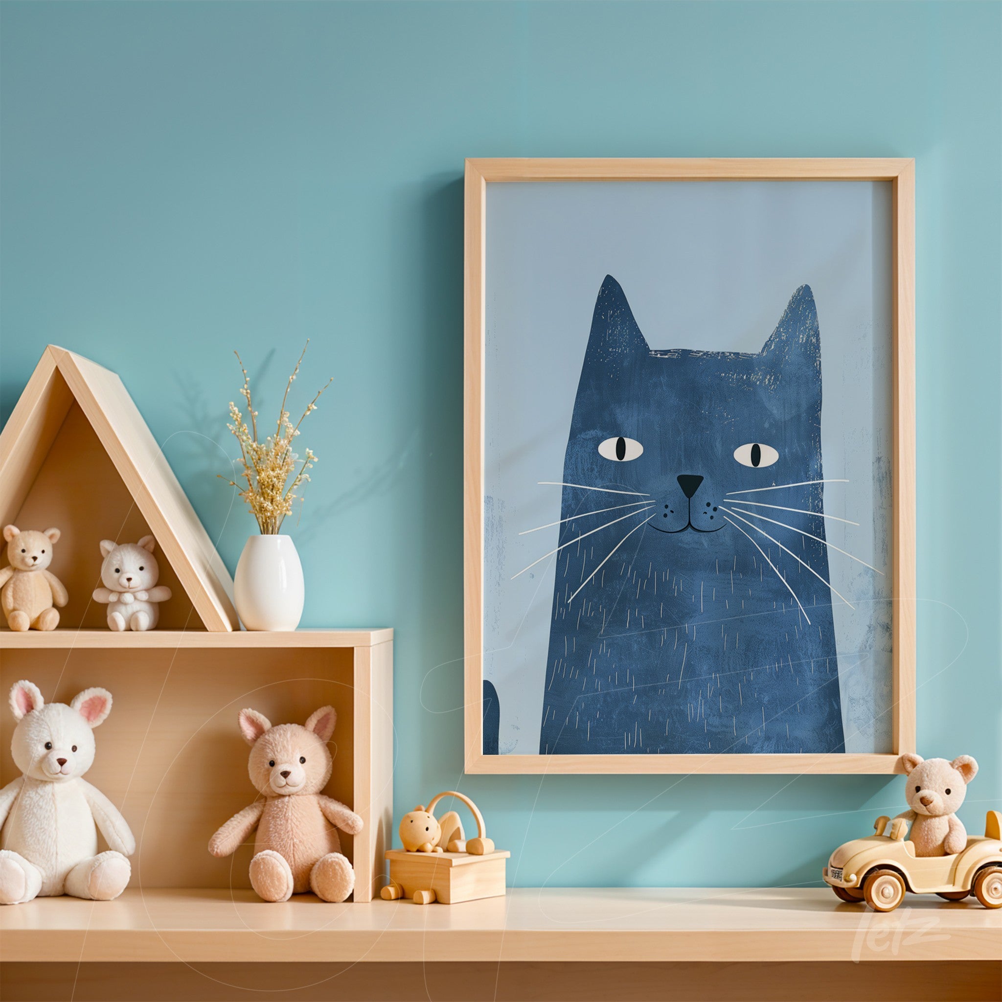 framed wall art featuring a blue cat illustration displayed in a children's room