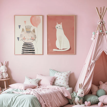 decorative wall art featuring cat illustrations in light frames against pink wall, along with a pastel-colored play tent