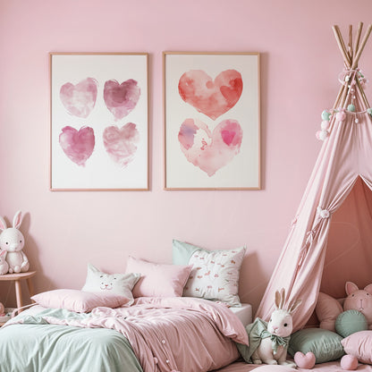 composition of two framed watercolor heart prints in light frame against pink wall