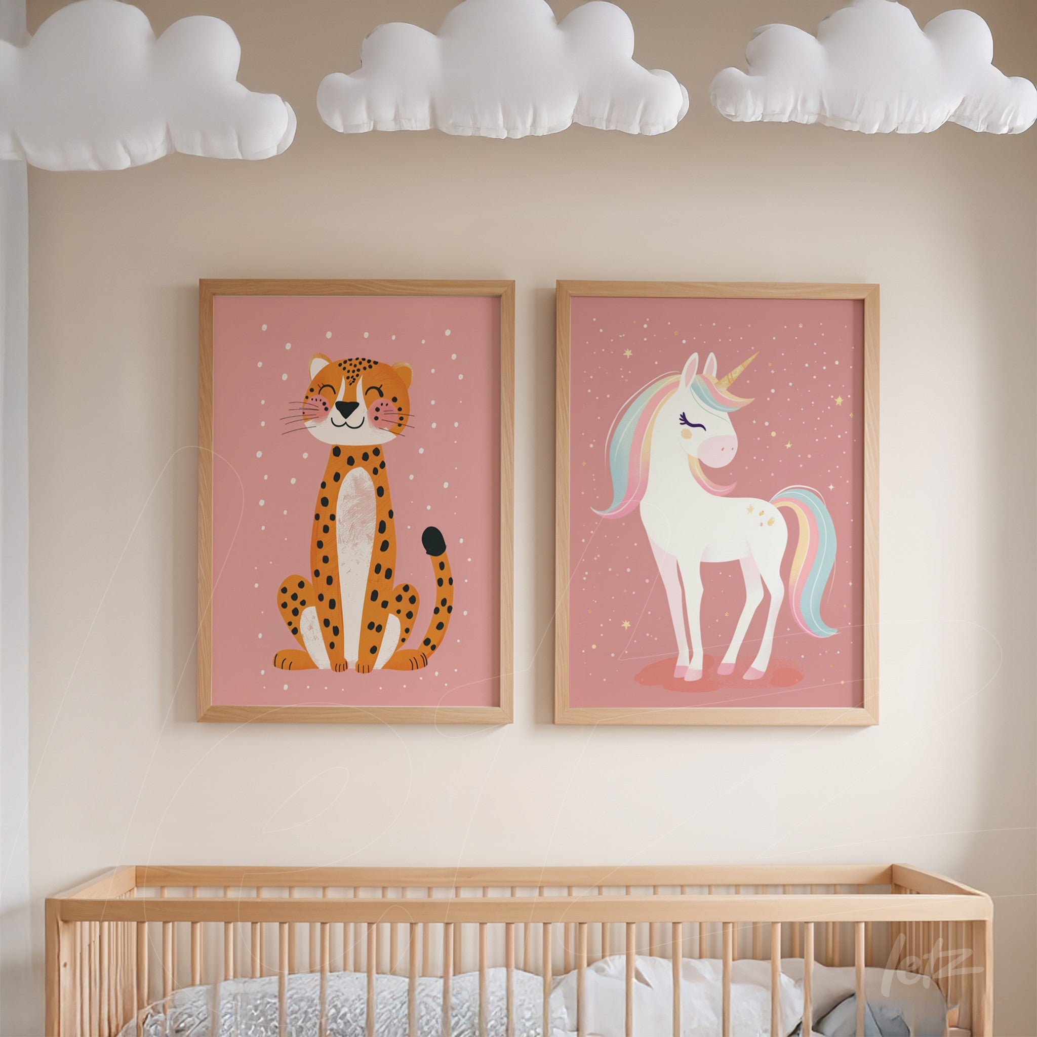 playful artwork composition featuring a smiling leopard and a colorful unicorn, both in light wood frames on a pink wall