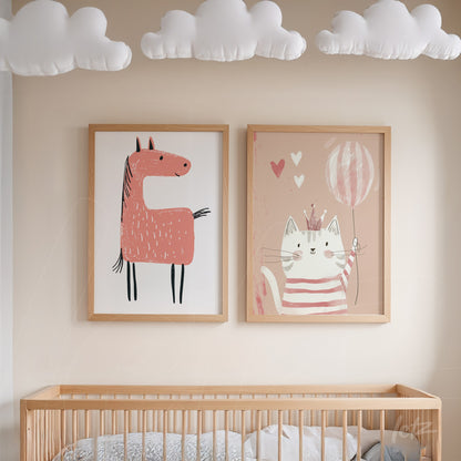 composition of kids' wall art featuring a pink horse and a cat holding a balloon, in light wooden frames on a neutral wall