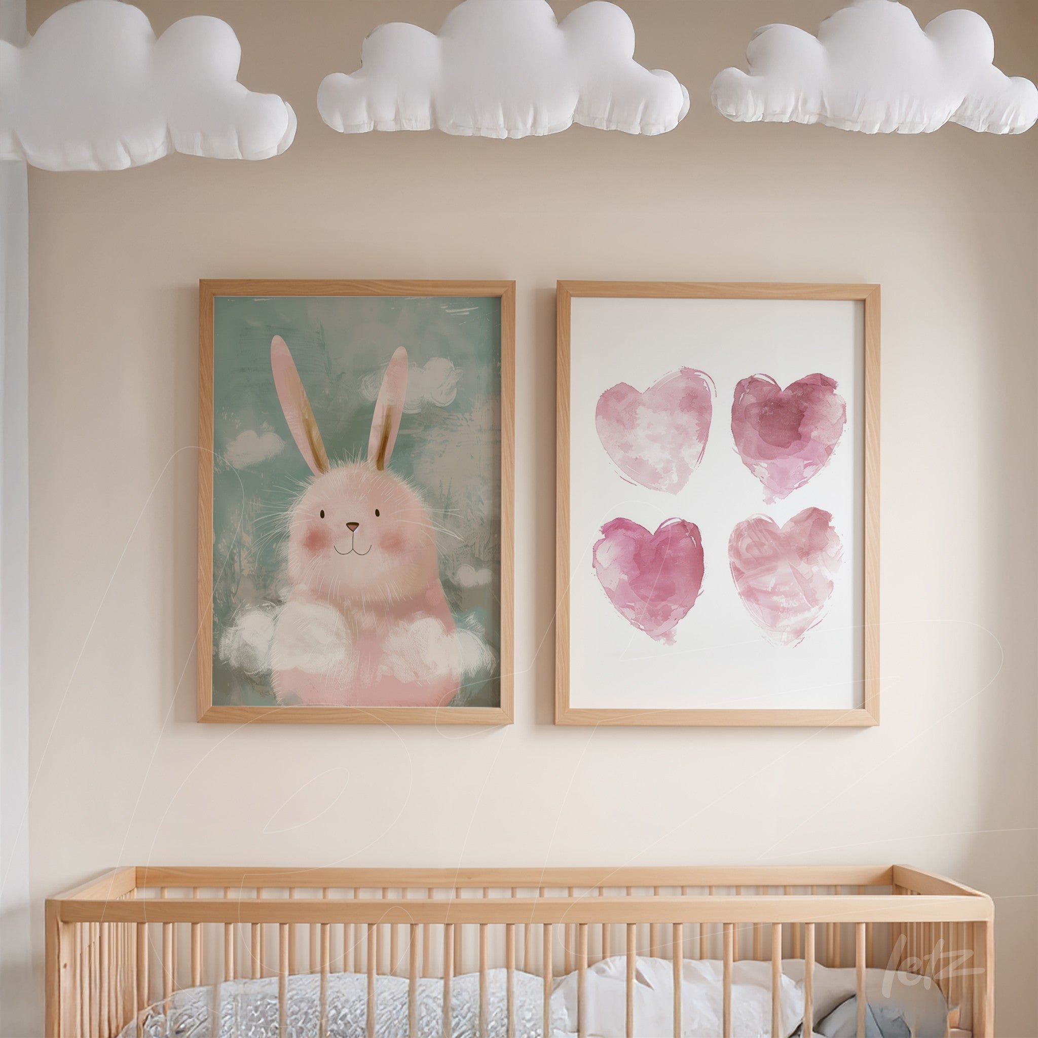 framed wall art composition featuring a cute bunny on a light background and pink watercolor hearts with light wood frames