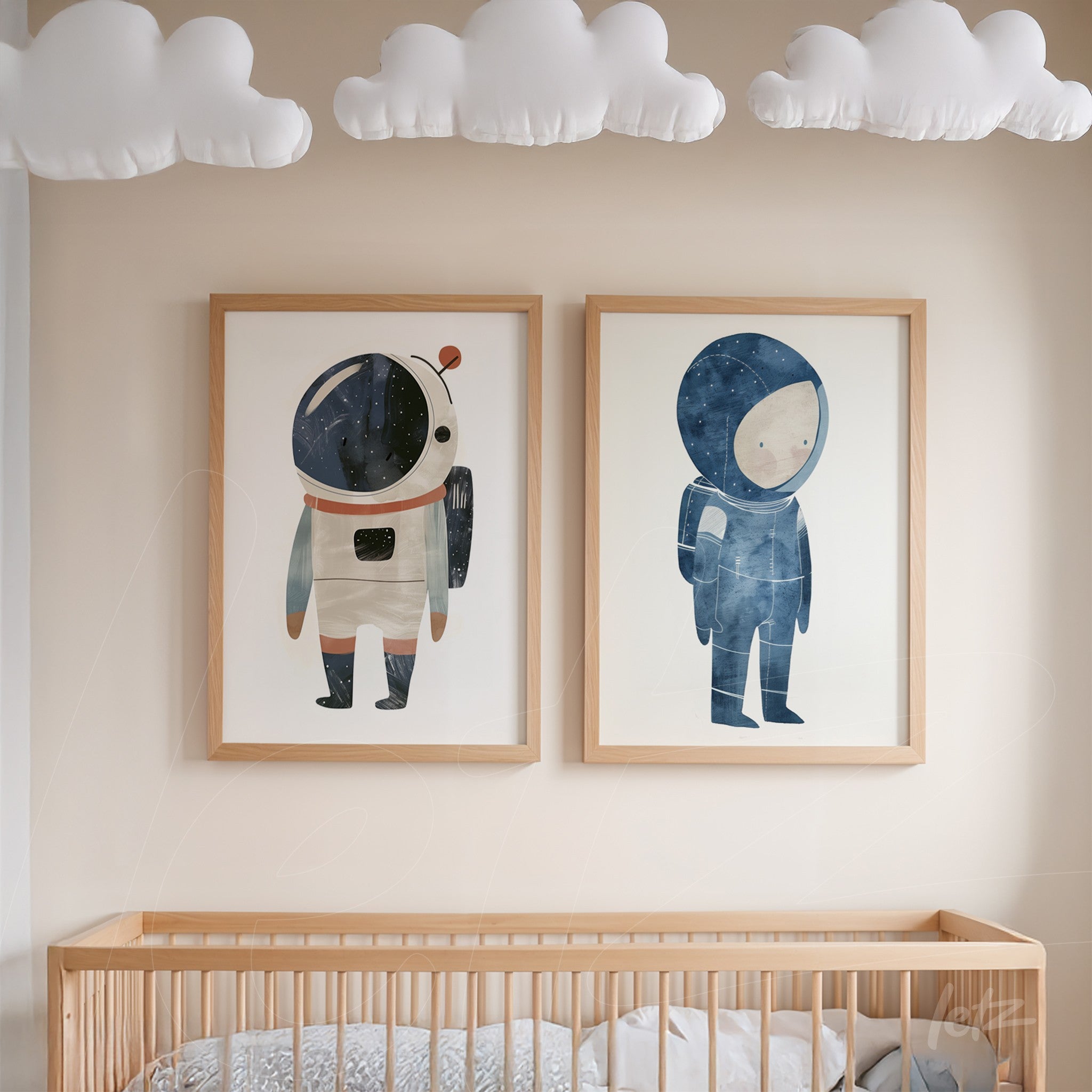 framed wall art composition featuring two astronaut illustrations with light wood frames displayed in a nursery with decorative clouds on the ceiling