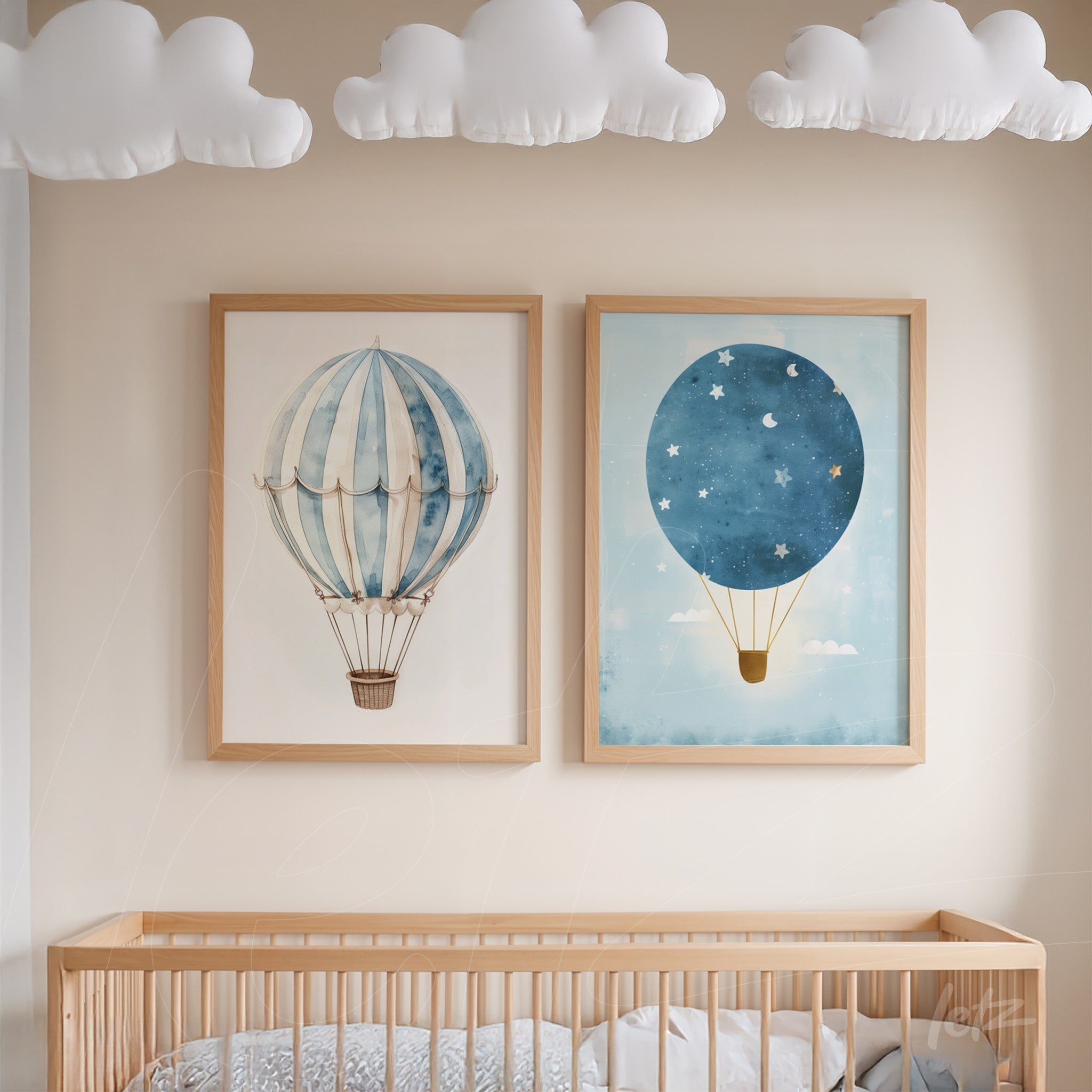 set of framed wall art featuring hot air balloons in light frames against a neutral wall