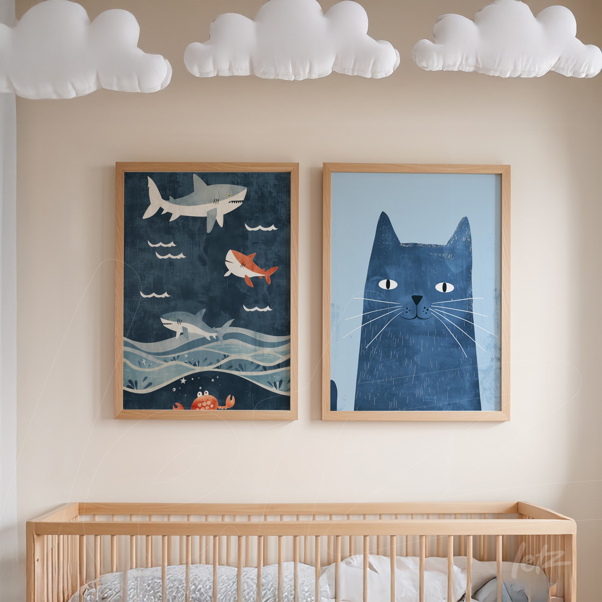 set of framed wall art featuring child-friendly illustrations, one depicting sharks swimming against a blue background and the other showing a blue cat in a light wood frame