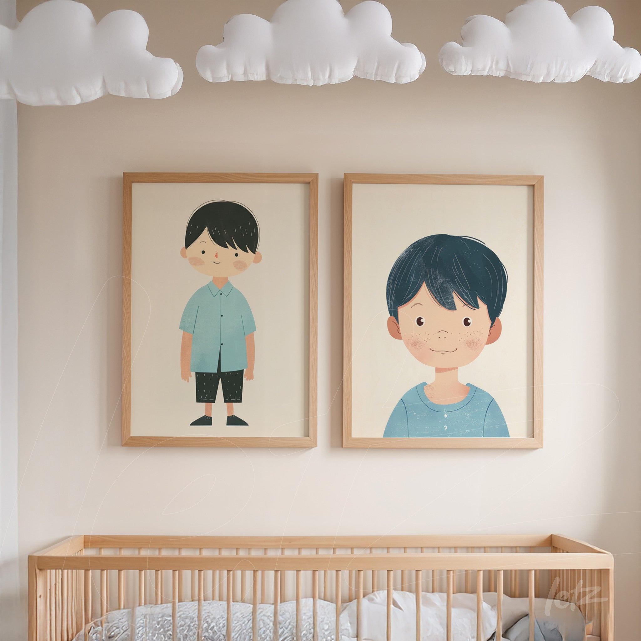 pair of framed children's illustrations of boys in light wooden frames, displayed on neutral wall above crib
