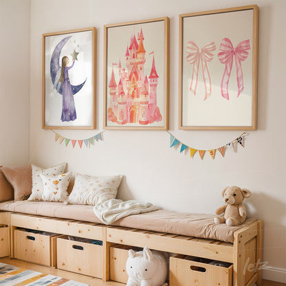 collection of three framed children's illustrations featuring a princess, a pink castle, and pink bows displayed above a wooden bench with storage drawers
