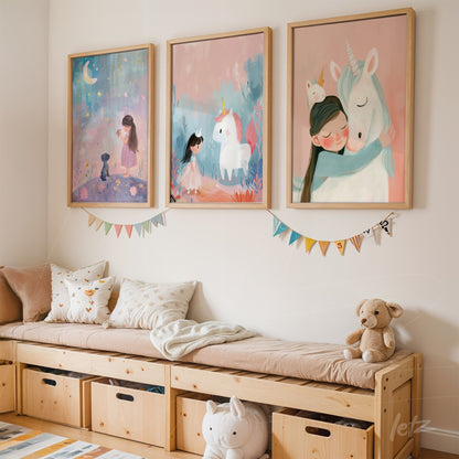 composition of children's wall art featuring illustrations of a girl, unicorns, and a moon, in light wood frames, displayed in a decorated bedroom with cushions and toys