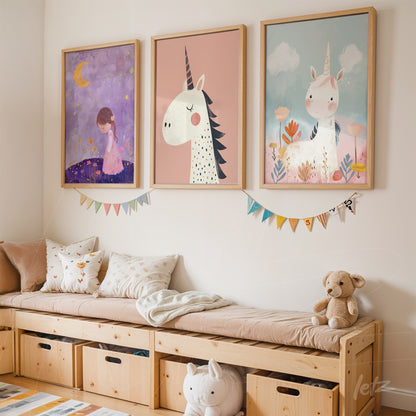 set of three child-friendly wall art pieces featuring unicorn and girl illustrations on light wall, framed in light wood