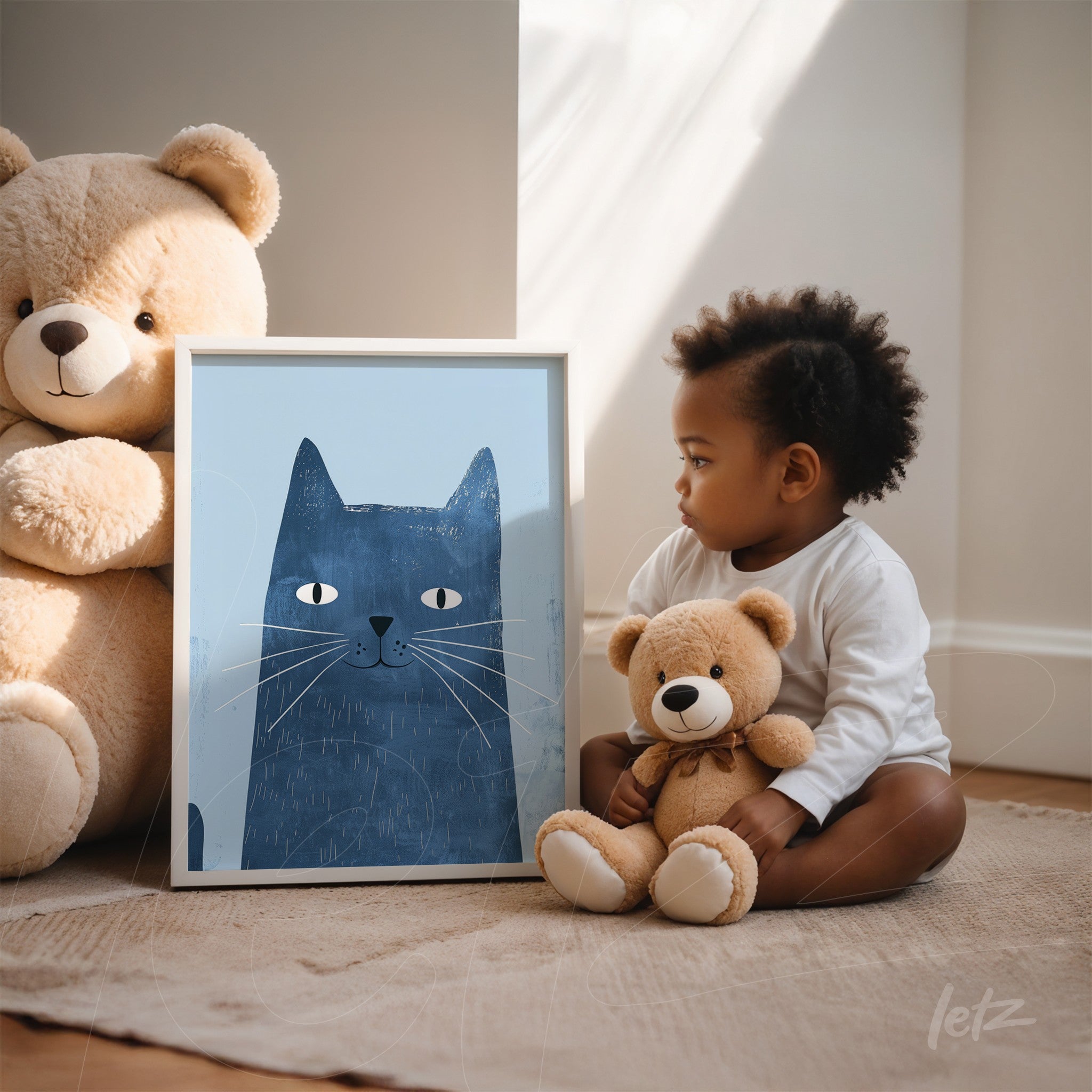 framed wall art of a blue cat illustration next to a child holding a teddy bear