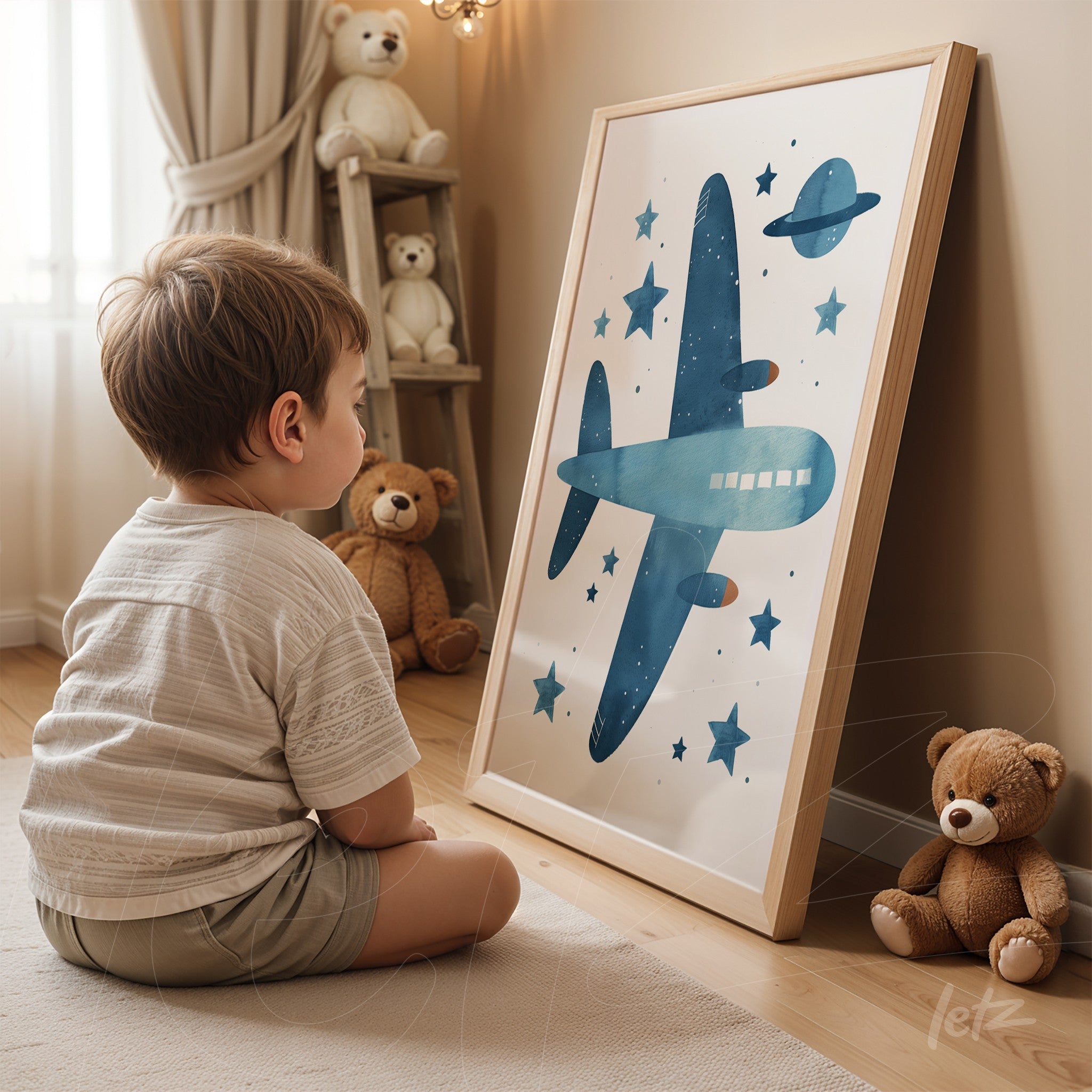 framed wall art featuring a blue airplane among stars and a planet, leaning against a light curtain wall