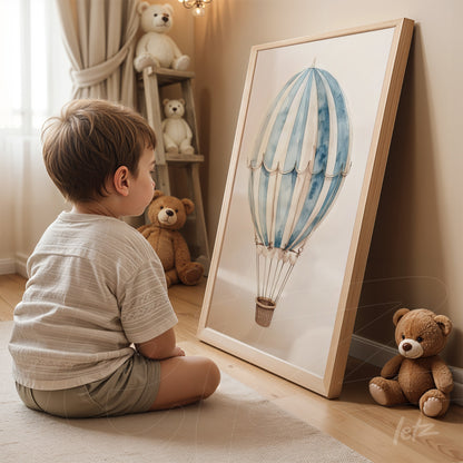 framed illustration of a hot air balloon in light wood frame displayed next to plush toys in a children's room setting