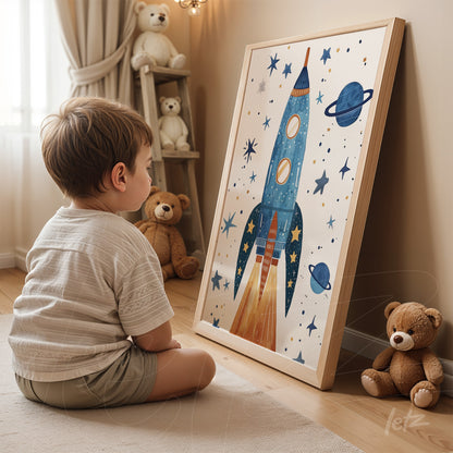 framed artwork featuring a blue rocket and planets in a light wood frame, displayed in a cozy setting with plush toys