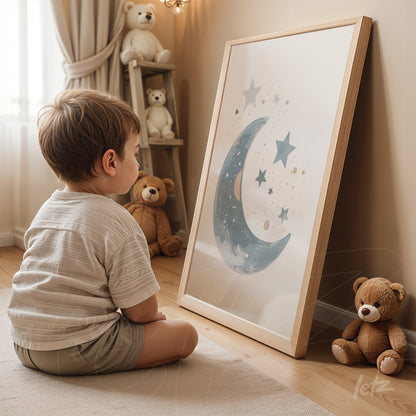 framed wall art featuring a soft-colored illustration of a moon and stars displayed beside plush toys in a child's room