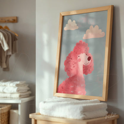 framed art featuring a pink poodle illustration in a light wooden frame displayed in a cozy setting with stacked towels