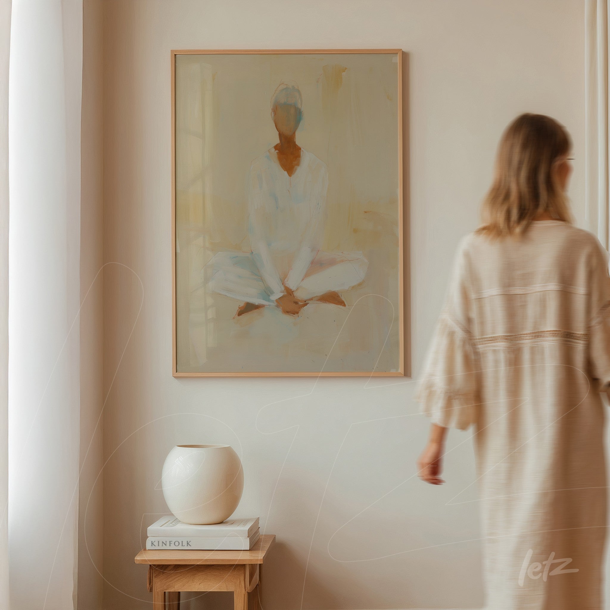 abstract artwork of a meditating figure in light frame on neutral wall
