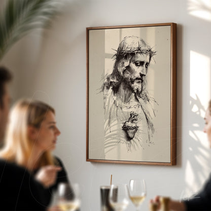 framed artistic illustration of jesus christ with sacred heart in light wooden frame displayed in a dining setting