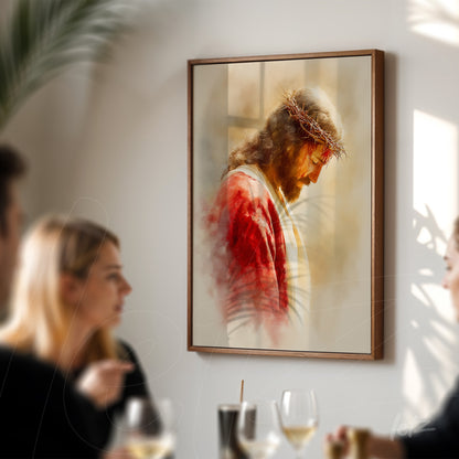 framed portrait of Jesus wearing a crown of thorns with a light wooden frame and soft background