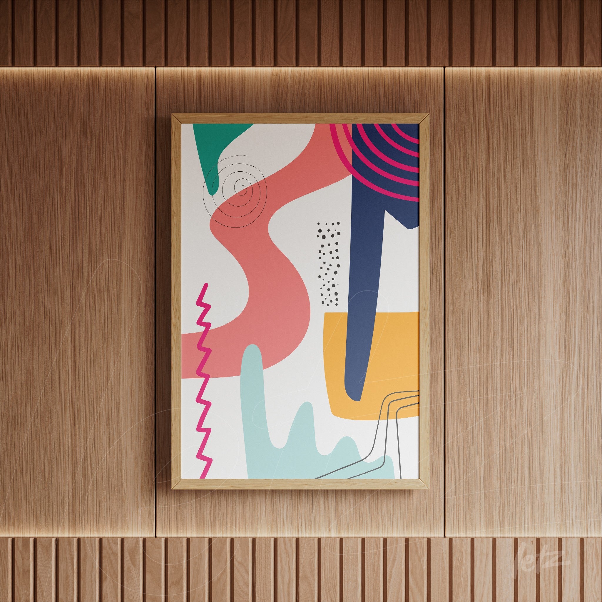 quadro abstrato colorido com formas geométricas em moldura de madeira clara, exibido em parede de madeira