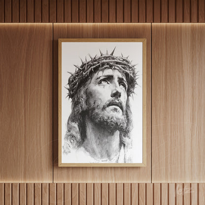 framed black and white portrait of jesus christ wearing a crown of thorns with a gold frame