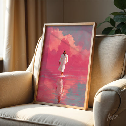 framed art of a solemn figure walking on water in pink hues with light wood frame