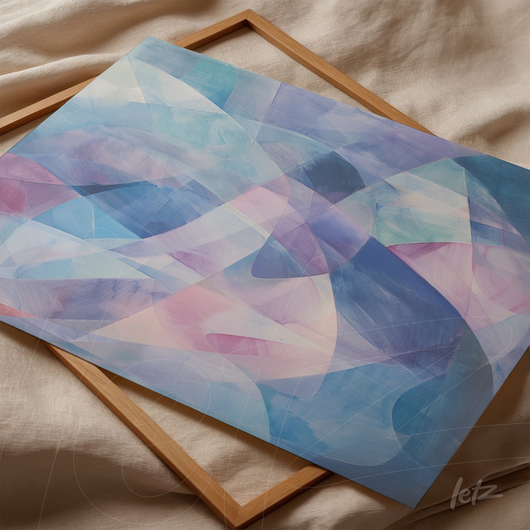canvas artwork featuring abstract shapes in shades of blue and pink, displayed in a light wood frame