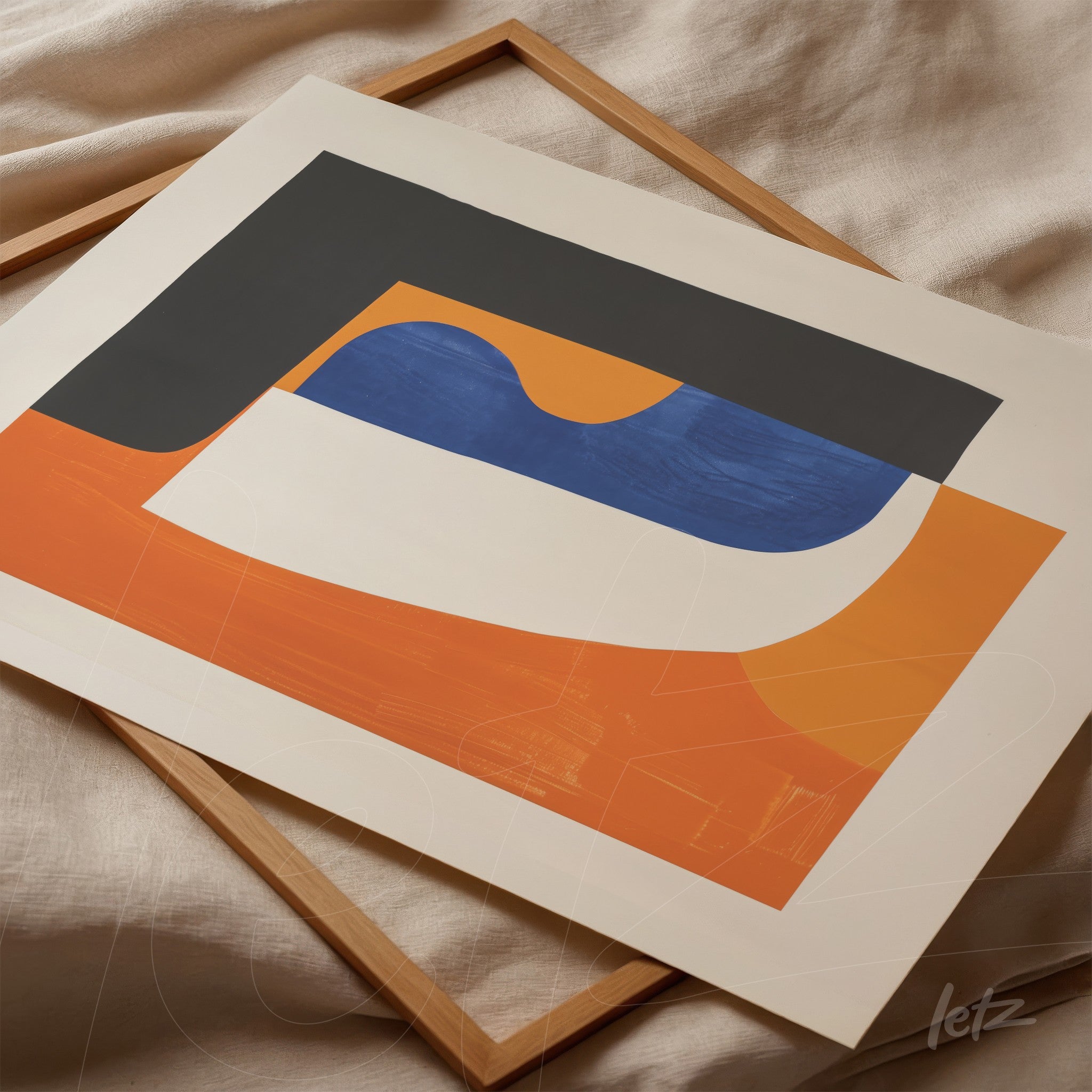 abstract art print featuring vibrant colors including orange, blue, and black in a light wood frame