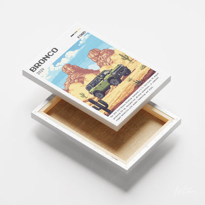 canvas print featuring retro design of a Bronco vehicle in a desert landscape with mountains in the background