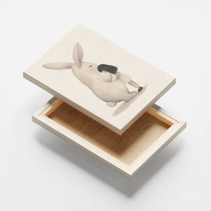 canvas print featuring an illustration of a rabbit holding a cup on a light background