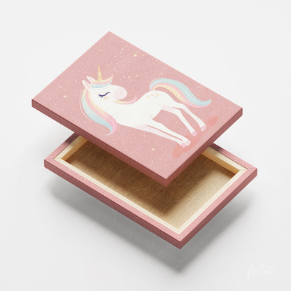 decorative box featuring a unicorn design with a pink sparkling background
