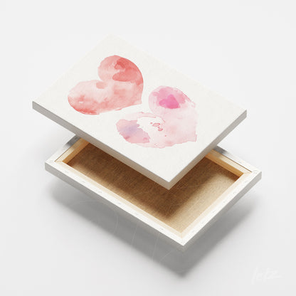 canvas print featuring watercolor hearts in soft pink hues