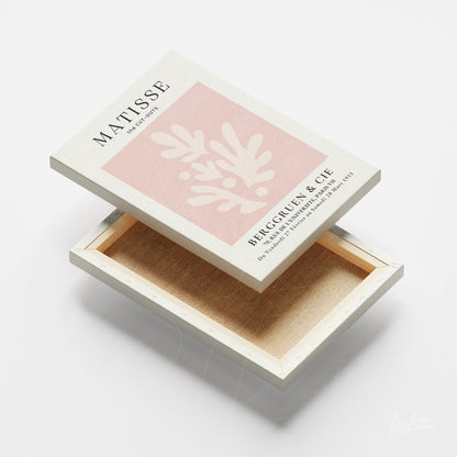 canvas art featuring modern design on light pink background with white frame and smooth texture