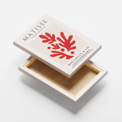canvas artwork featuring abstract red shapes on a light background emphasizing organic forms