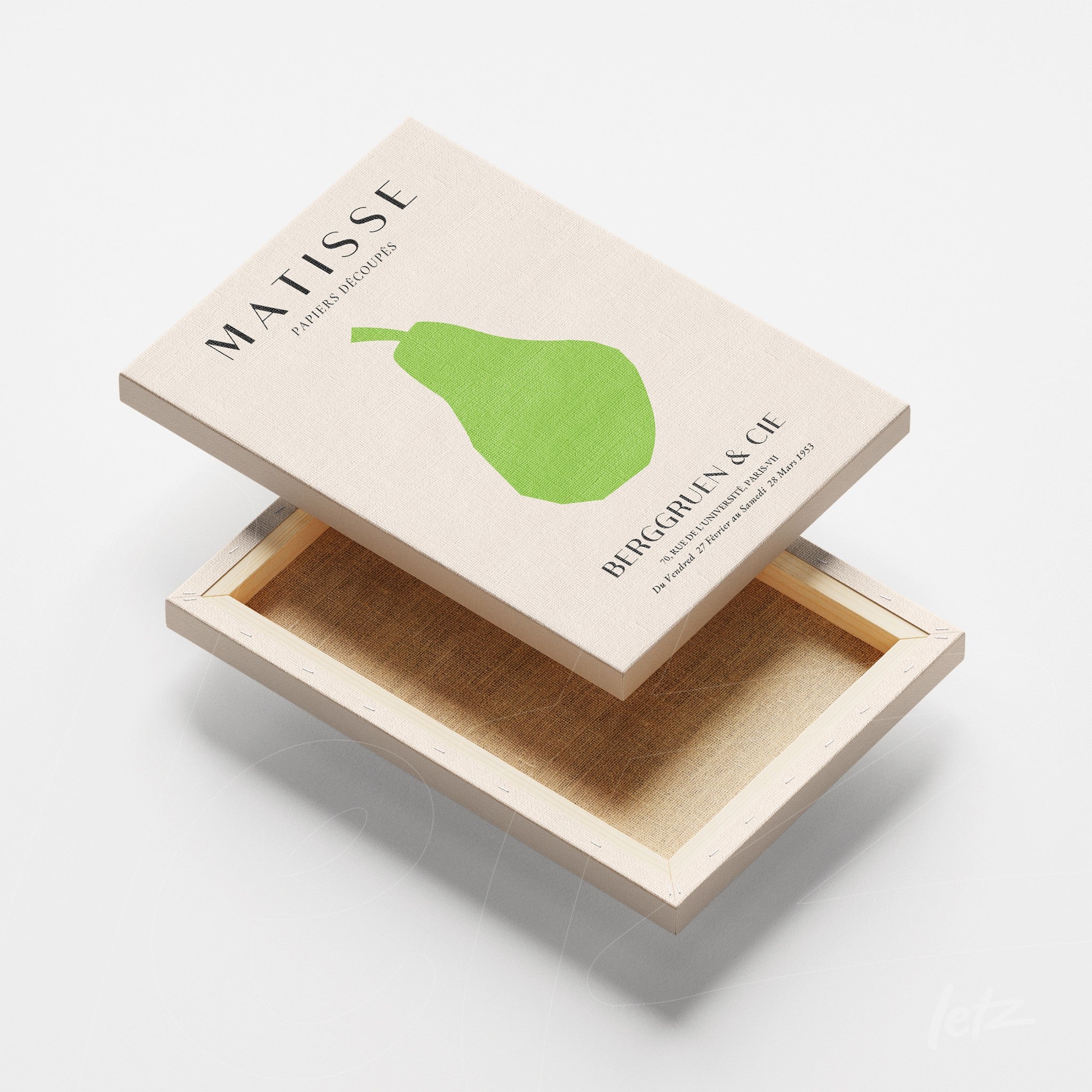 canvas print featuring a stylized green pear illustration on a light background, mockup of an opened packaging